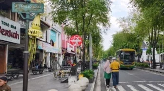 Jangan Asal Foto! Pemkot Jogja Bongkar Masalah di Balik Plang Malioboro Portable