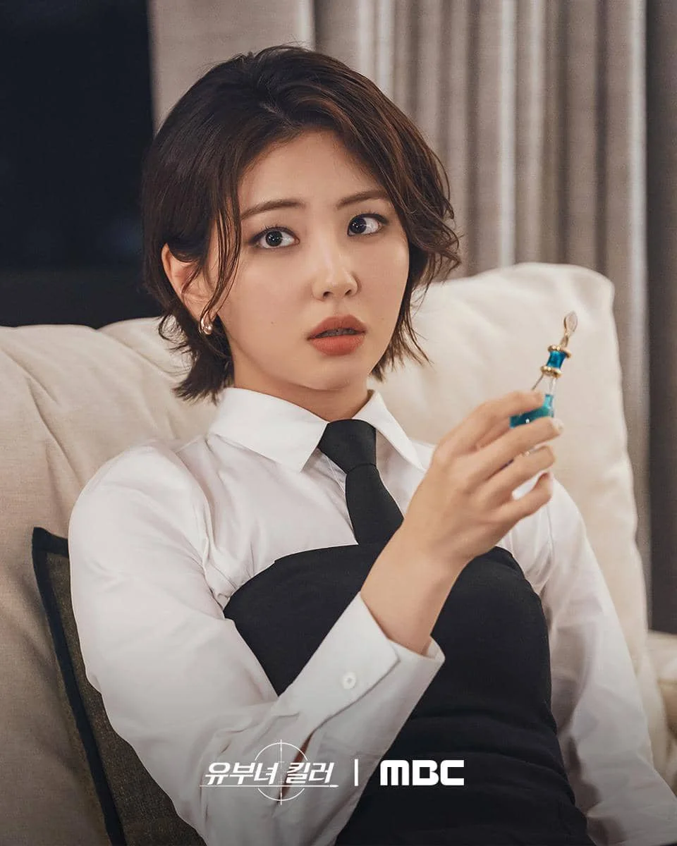 Potongan adegan A Bona Fide Killer dari MBC dalam materi promosi serial tersebut, dengan suasana cerita yang dramatis.