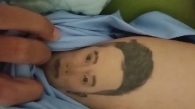 tato Yunita Love Taufik di tubuh korban