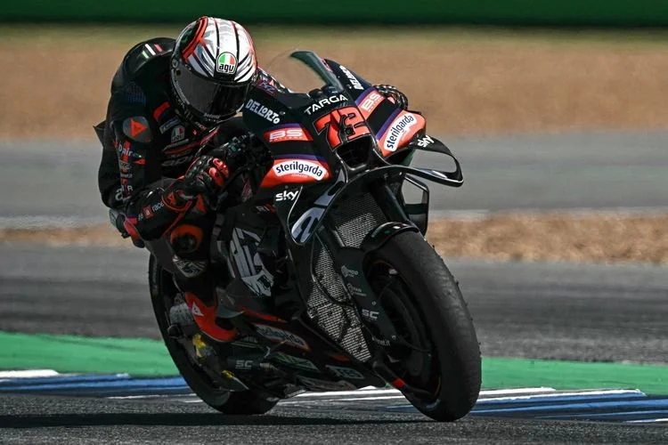 Pebalap Italia dari Aprilia Racing Marco Bezzecchi beraksi dalam MotoGP Thailand 2026 di Sirkuit Internasional Buriram di Buriram pada 1 Maret 2026. (Foto oleh Lillian SUWANRUMPHA / AFP)