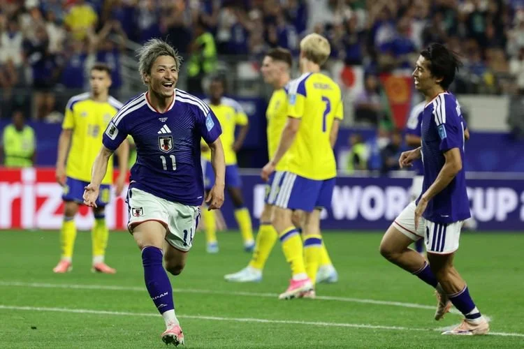 Daizen Maeda merayakan gol dalam pertandingan sepak bola Grup F Piala Dunia 2026 Jepang vs Swedia di Stadion Dallas di Arlington pada 25 Juni 2026. (Foto oleh Aric Becker / AFP)