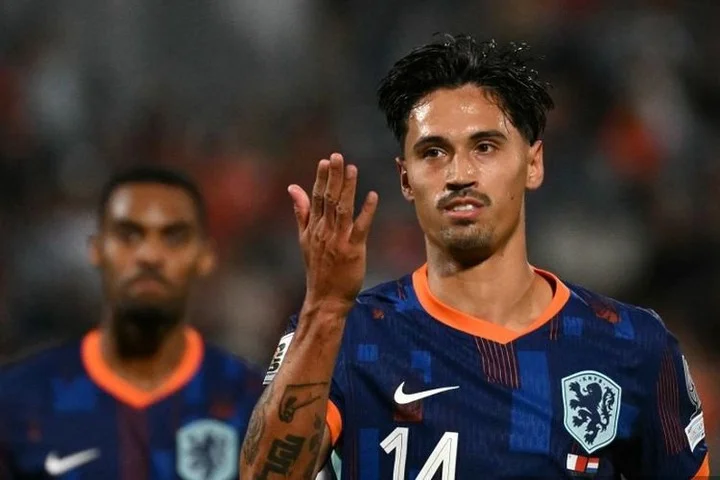 Tijani Reijnders (kanan) merayakan gol dalam pertandingan Kualifikasi Piala Dunia 2026 antara Malta vs Belanda di Stadion Nasional di Ta' Qali, pada 9 Oktober 2025. (Foto oleh Alberto PIZZOLI / AFP)