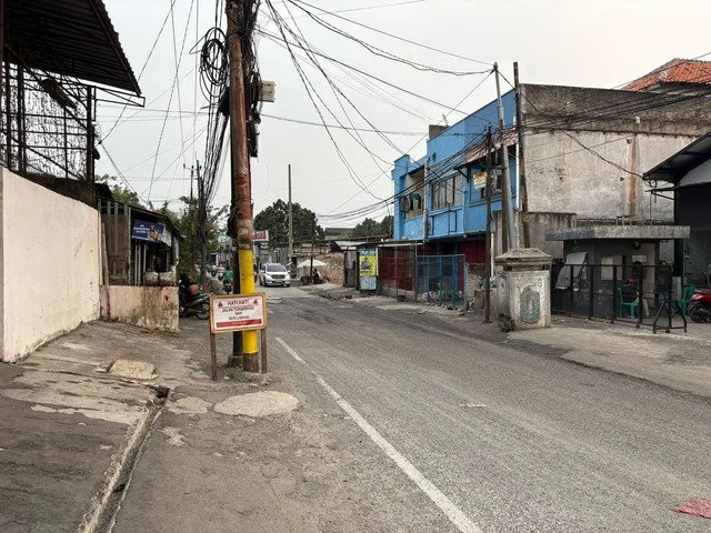 Jalan di Pesanggrahan Kini Tak Lagi Tergenang Usai Saluran Air Dikeruk