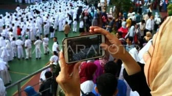 ASN DKI Boleh Masuk Kerja Jam 12 demi Antar Anak Sekolah, Wajib Kirim Foto Bukti!