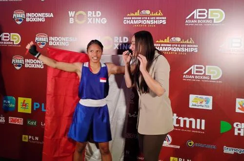 Anggie Intania Chalik petinju Indonesia raih emas. (Foto: Cikal BintangOkezone)